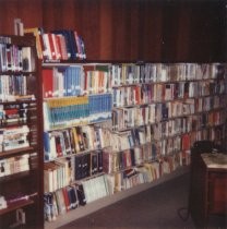 Overcrowded bookshelves, 1984