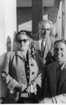 Two men and woman at San Francisco Airport possibly sending off their son, 1954