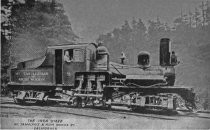 The "Iron Steed" engine No. 8 and engineer, circa 1920