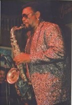 Sax player on stage, possibly Clarence Clemmons