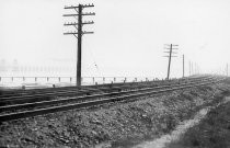 Richardson Bay Bridge beyond railroad tracks, circa 1930s