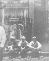 Group in front of Lockwood Pharmacy, early 1900s