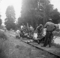 Removing the railroad tracks on Miller Ave., circa 1955