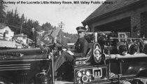 Fireman at Wheel of FireTtruck, 1940s