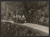 Passengers in a gravity car, circa 1910