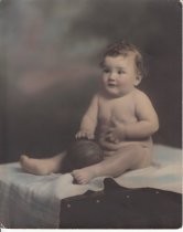 Portrait of sitting baby taken at 8 months, Oct 1930