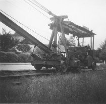 Removing the railroad tracks on Miller Ave., circa 1955