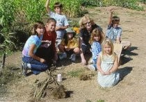 Edna Maguire School 5th grade buddies planting in Children's Garden, 2007