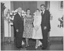 Joe Miller, Guinevere Robinson, Betty Eva, and Doug at a wedding, 1961