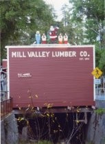 Mill Valley Lumber Yard shed with Christmas figures on roof, 2012-2014