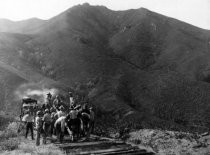 Crew tearing up railroad track, 1930