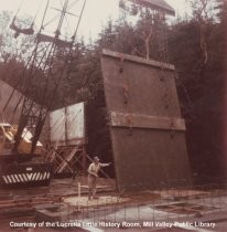 Crane raising a wall in library construction, 1965