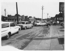 Cars lined up at gas station on Miller Avenue, 1974