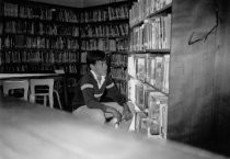 Boy looking for a book, 1985