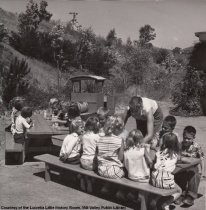 Strawberry Point - kindergarten play yard at snacktime, date unknown