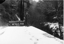 Bill Feeney Sr. with gravity car at Lee Street siding, 1922