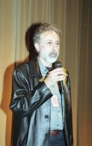 Nezam Manouchehri speaking at a screening, 2002