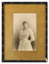 Black and white portrait of a young women, probably in her wedding gown