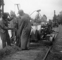 Removing the railroad tracks on Miller Ave., circa 1955