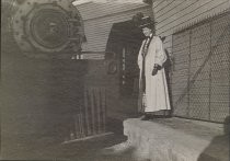 Female passenger and engine of the Mt. Tamalpais and Muir Woods Railway, circa 1902