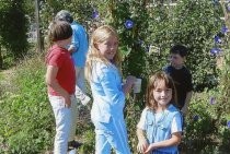 Edna Maguire School 5th grade buddies planting in Children's Garden, 2007