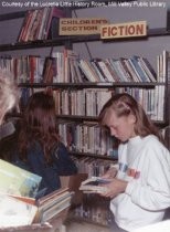 Girl at Library Book Sale, 1990