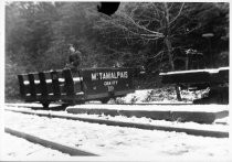 Bill Feeney Sr. on gravity car at Lee Street siding, 1922