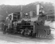 Engine #4 with employees and passengers, circa 1908