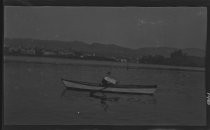 Lake Merritt, Raymond Coyne in a boat, circa 1918