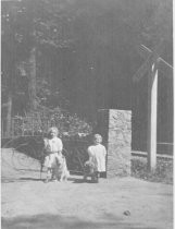 Jean Ward Keiler and sister at gate, circa early 1900s