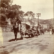 People dressed as Native Americans in 4th of July parade, 1908