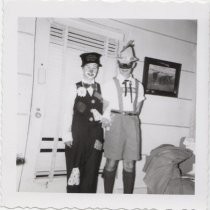 Two individuals in costume, 1956