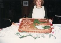 Anne Montgomery with 25th anniversary cake, 1991