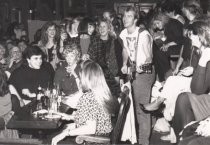 Dennis Quaid playing guitar, date unknown