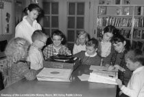 Carnegie Library - Children by a record player, 1960s