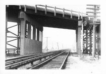 Railroad commuter train line, telephone poles, Richardson Bay Bridge, circa 1930's