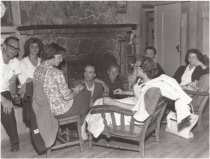 West Point Inn; gathering of people around fireplace circa 1960
