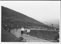 Women's Dipsea Hike participants rounding a bend, 1920