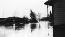 Cars In flooded street, 1925