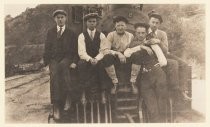 Five men and locomotive, 1916