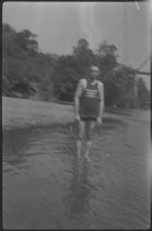 Man standing in water, circa 1922