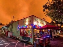 Orange sky outside Joe's Taco Lounge on Miller Avenue, 2020