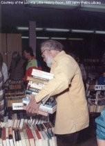 Man at Library book sale, 1990