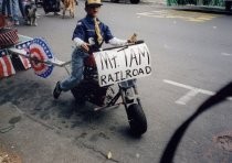 Boy Scout on a motor scooter in the Memorial Day Parade, 1999