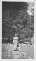 Woman standing outside in Yosemite Valley, unknown