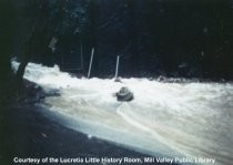 Flood waters run from Maytag's Road onto West Blithedale during the storm of January 4, 1982