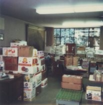 Boxed books in book sale area, 1987