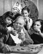 Frau Valborg sharing cookies with her neighbors, date unknown