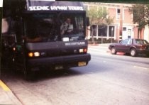 Tour bus on Throckmorton Avenue, date unknown