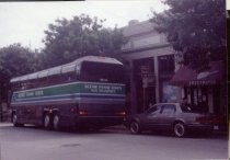 Tour bus stops for snacks at Living Food, date unknown